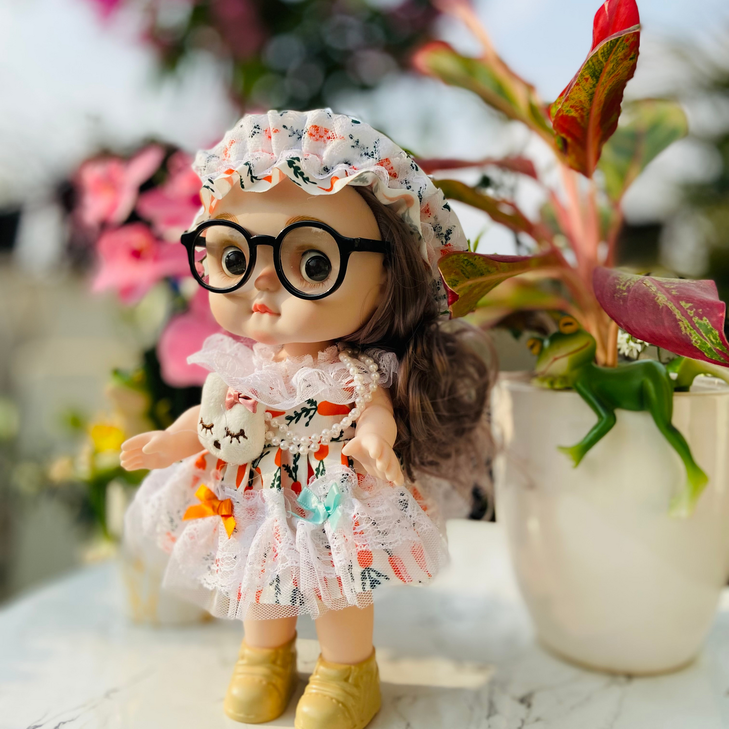 NestyFox Realistic Baby Doll with Glasses & Long Hair – 26cm Cute Toy Doll for Girls