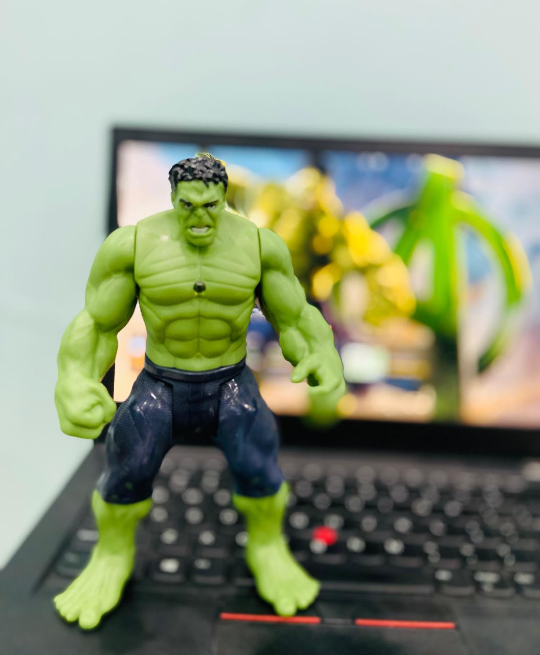 Hulk 08 scale action figure from Avengers: Age of Ultron, showcasing detailed green muscles and expressions, standing amidst a cityscape backdrop, ready to unleash his strength.