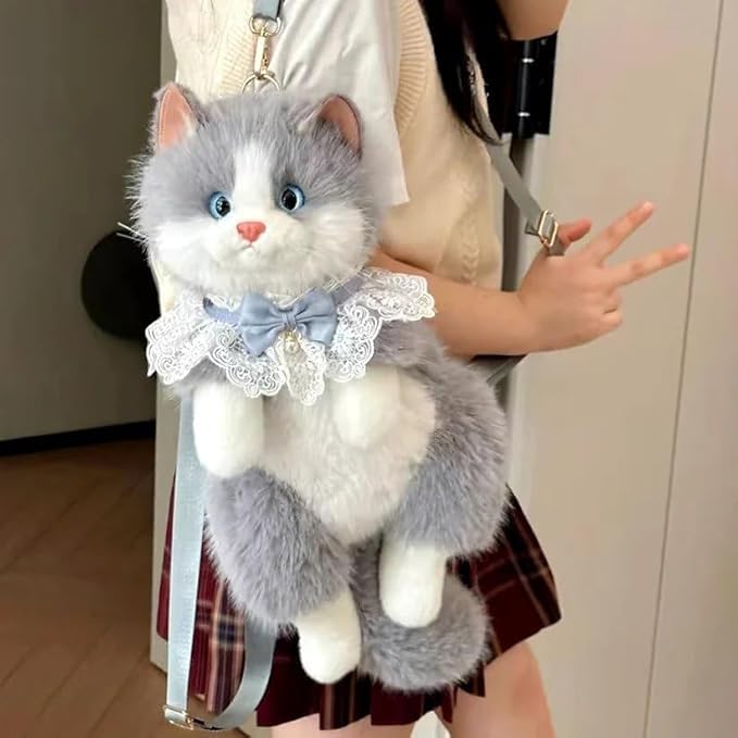 Grey cat backpack worn as crossbody by girl in plaid skirt