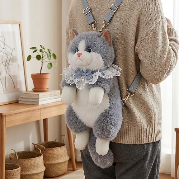 Grey cat backpack worn on back - cozy home setting
